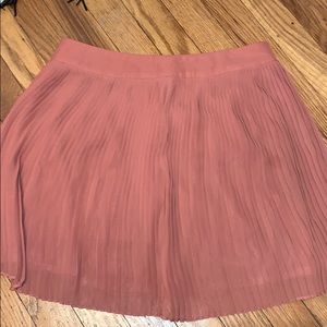 Peach mini skirt. NEVER WORN.